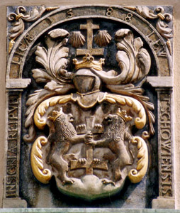 The crest of Lőcse on a house, carved into stone
