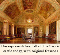 The representative hall of the Sárvár castle today, with original frescoes